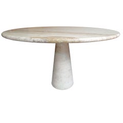 A Travertine table by Angelo Mangiarotti