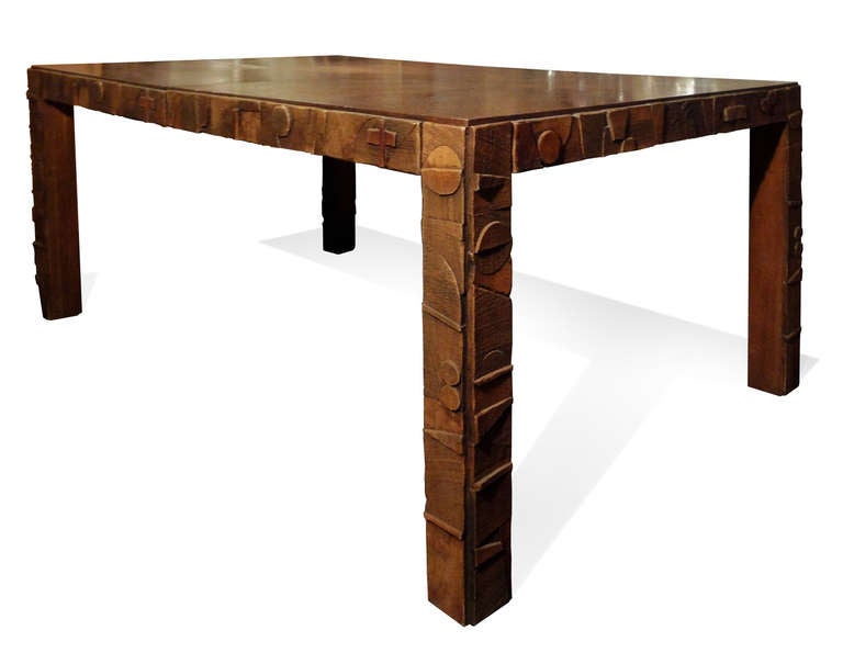 An oak-wood and resine dining table decorated with geometric motifs by The Lane Company. Virginia, 1950”²s.