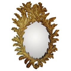 A Barroque style looking glass.