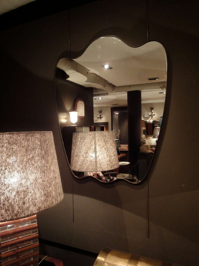 Italian A large curvy mirror