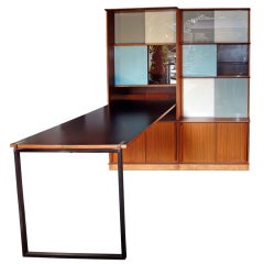 A  wooden 
glass secretaire by Oscar.