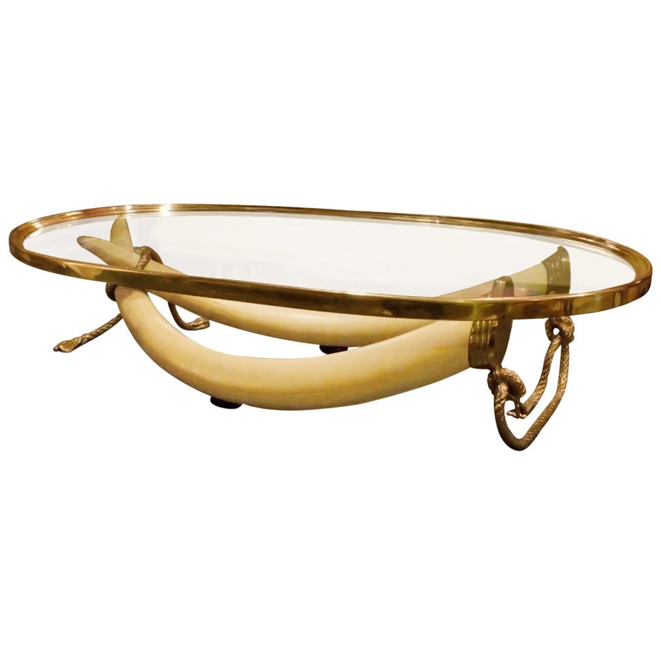 A Large Resin Tusk Coffee Table