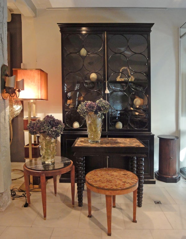 A tall stand-lamp in brass and perspex simulating tortoiseshell Signed on its base (image 9).  
