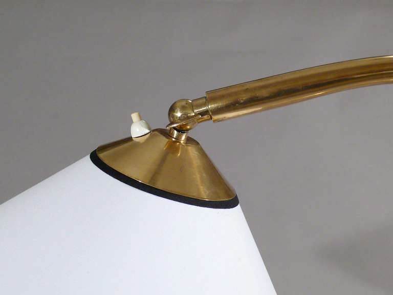 Adjustable standing lamp in brass.
c 1950, France.