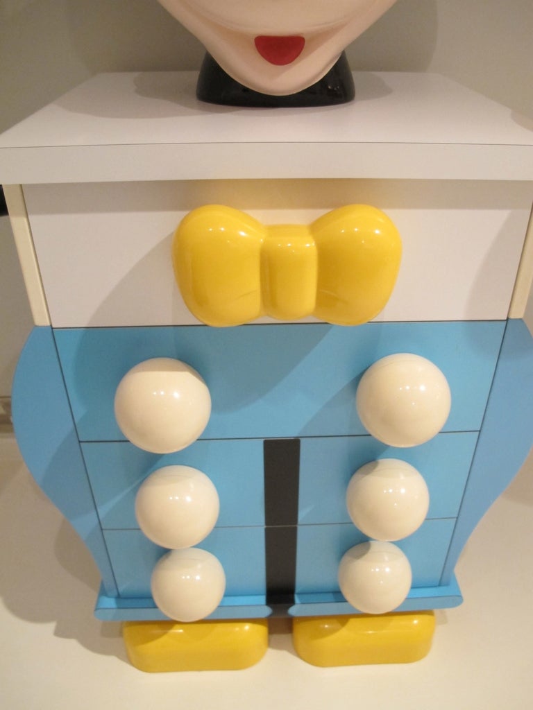 A mickey mouse bedside chest of drawers edited for Disney by Starform, France 1980's.
Moulded plastic, wood