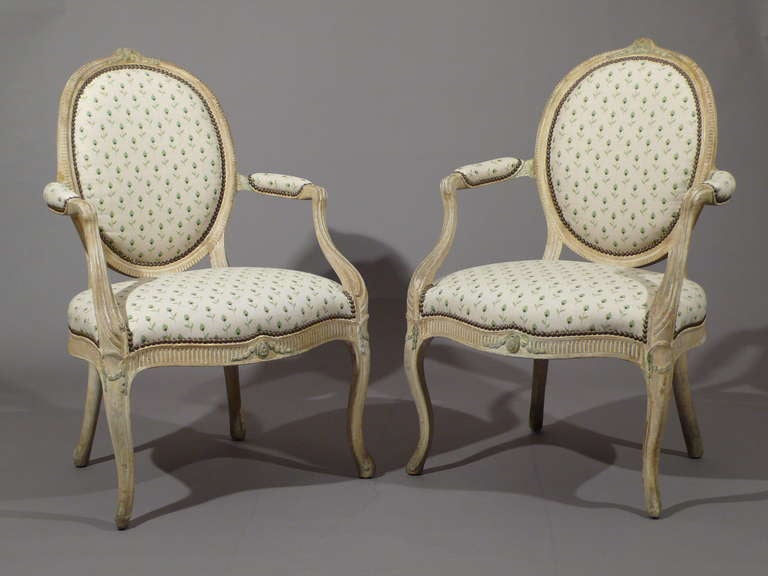 A pair of George III period lacquered armchairs, circa 1775, England.