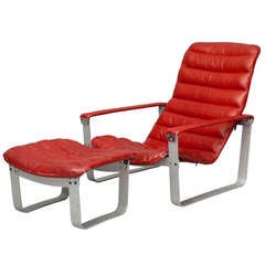 Vintage A Late 1960
s Easy Chair And Stool In Red Leather 
Aluminum