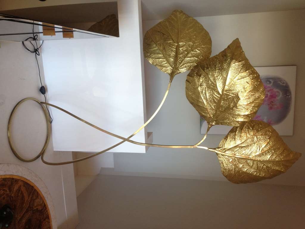 A three leaf brass floor lamp by Tomasso Barbi, Italy c.1970.