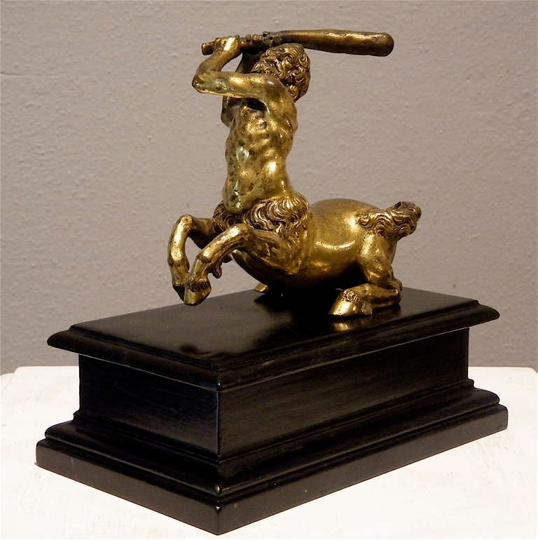 a Florentine gilt bronze sculpture depicts 