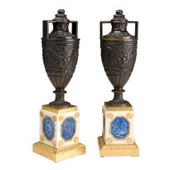 Pair of Patinated Bronze and White Marble with Lapis Lazuli Bases