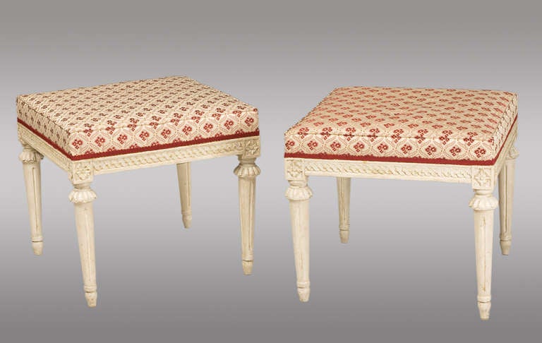 Pair of carved wood swedish stools. Upholstered in Rubelli silk. Eighteenth Century.