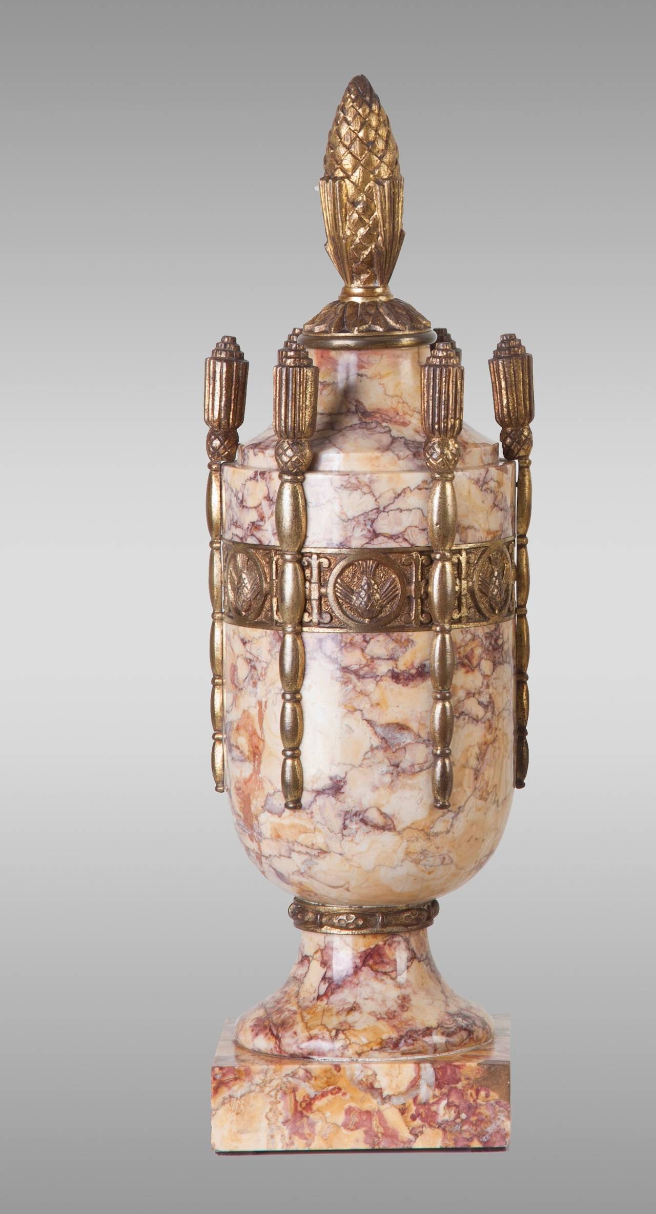 Pair of Art Deco marble urns with bronze, France, circa 1920.