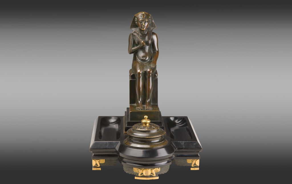 Patinated bronze inkstand and black marble with the figure of Queen Hatshepsut, Pharaoh of Egypt, circa 1860.