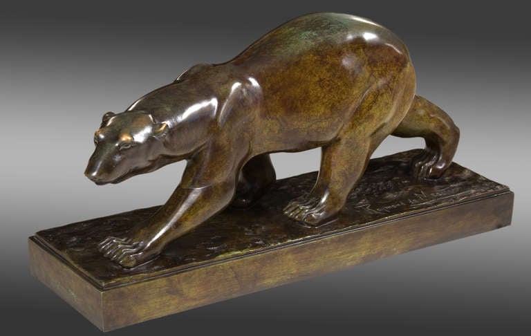 Raymond de Meester bear in bronze. Excellent ligth brown and green patina. Signed on the base. About 1940