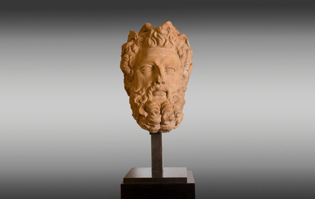 Great head of god Zeus in terracotta, mounted in patinated bronze base.
Probably part of large statue, 18th century.