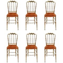 Set of six brass spindle back Used Chiavari dining chairs