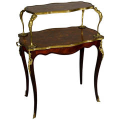 Antique A fine Louis XV style ormolu mounted marquetry two-tier table