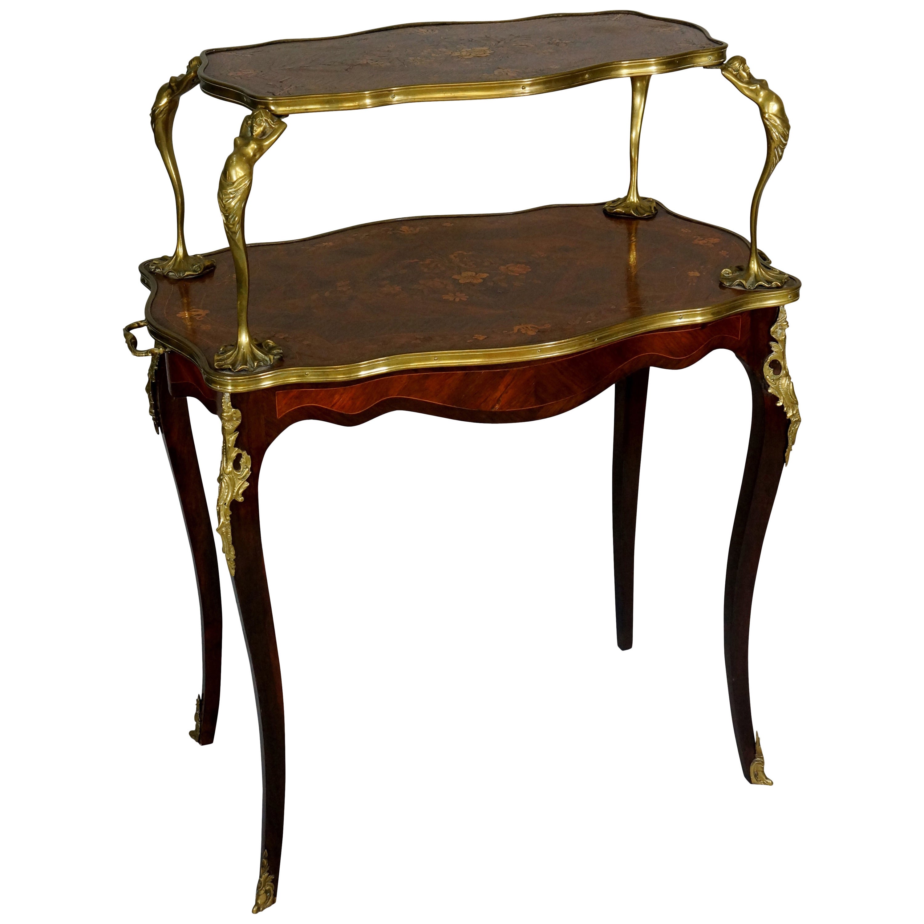A fine Louis XV style ormolu mounted marquetry two-tier table