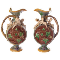 Matched pair of antique Minton majolica 'Protat' ewers