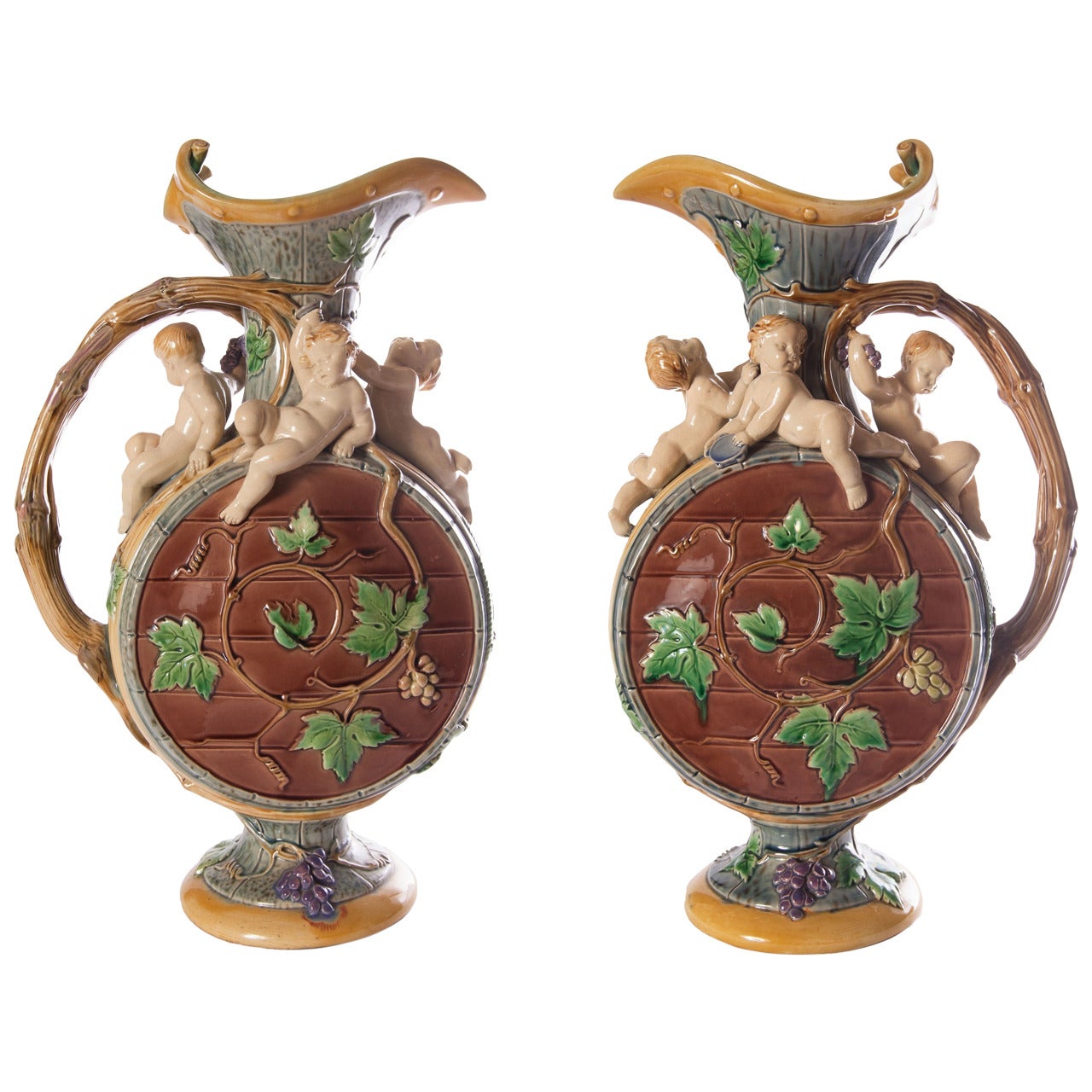 Matched pair of antique Minton majolica 'Protat' ewers