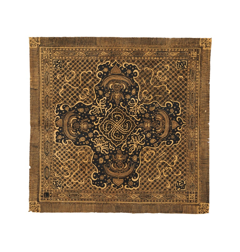 A Tengkolok (Headdress), from Kelantan area, with calligraphic and Muslim motif, in natural indigo motif. The Javanese word 