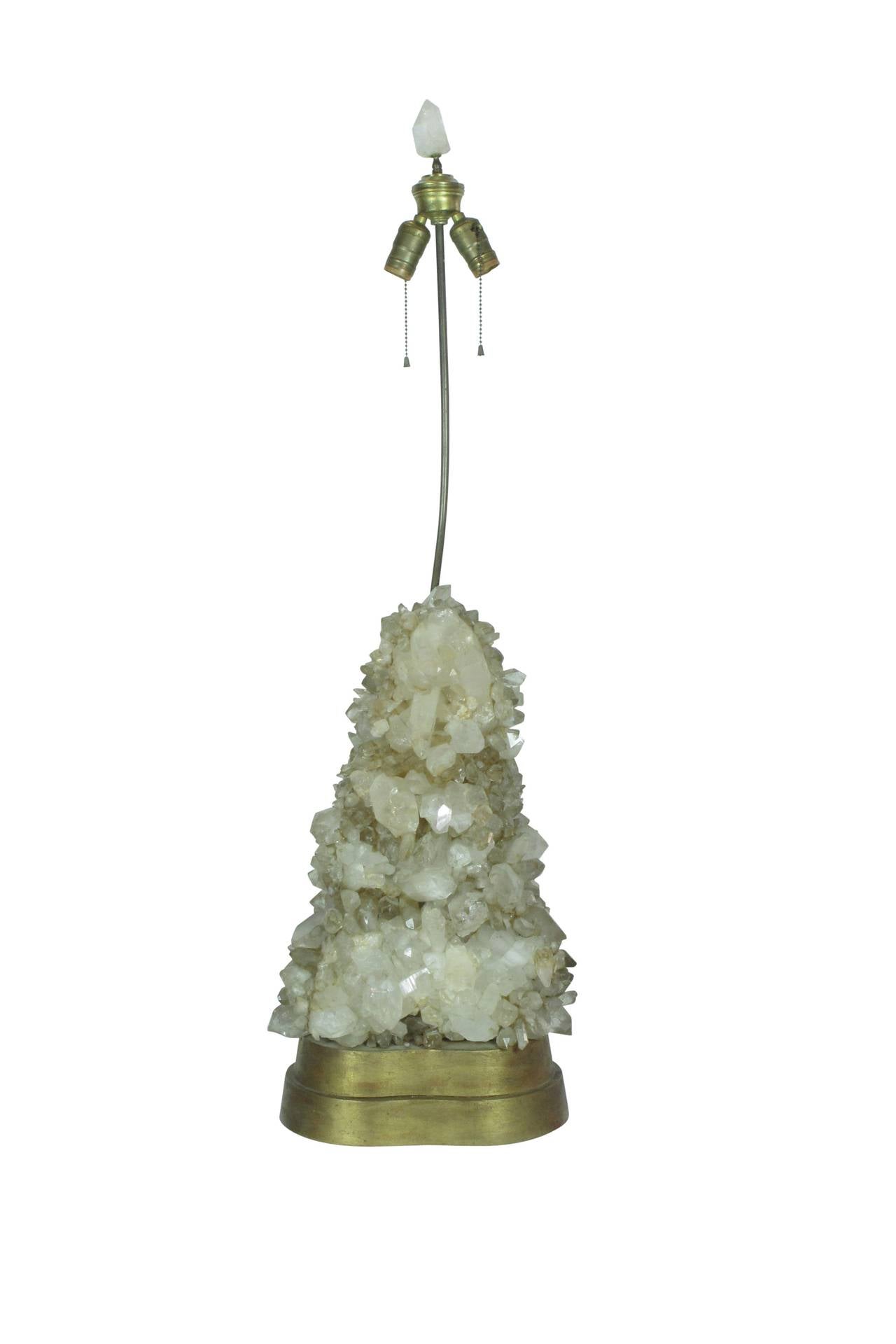 Carole Stupell Rock Crystal Table Lamp USA 1940's. Chic rock crystal table lamp by Carole Stupell with gold leaf base. Retains original finial. An excellent example of this lamp with a the back of the lamp complete with crystals. Height to the top