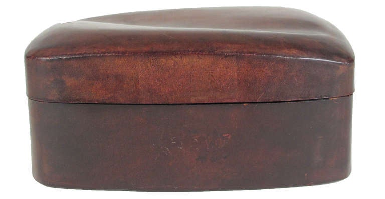 Rich oxblood colored leather. Marked on bottom.