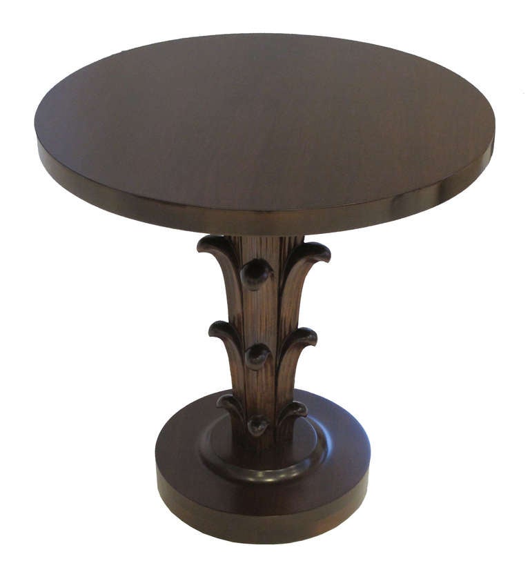 With circular tops  supported on acanthus modeled stems. Both tables retain metal tags on the undersides of the tops, which read: John Stuart Inc. New York • Grand Rapids. 
John Stuart was the major NYC based distributor of Widdicomb.
