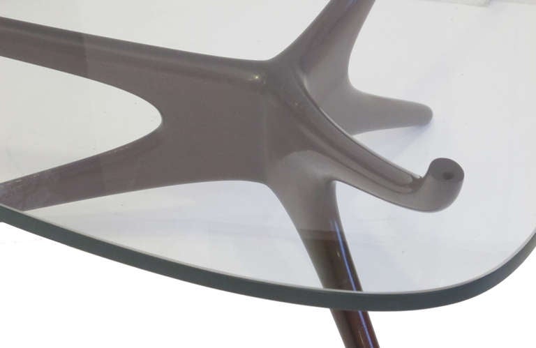 A custom size coffee or cocktail table (Model 413) from Kagan's sculptured series. We purchased the walnut base from the son of the original owner, a NYC/ Long Island architect. The 3/4 inch custom glass top was created from a template designed by