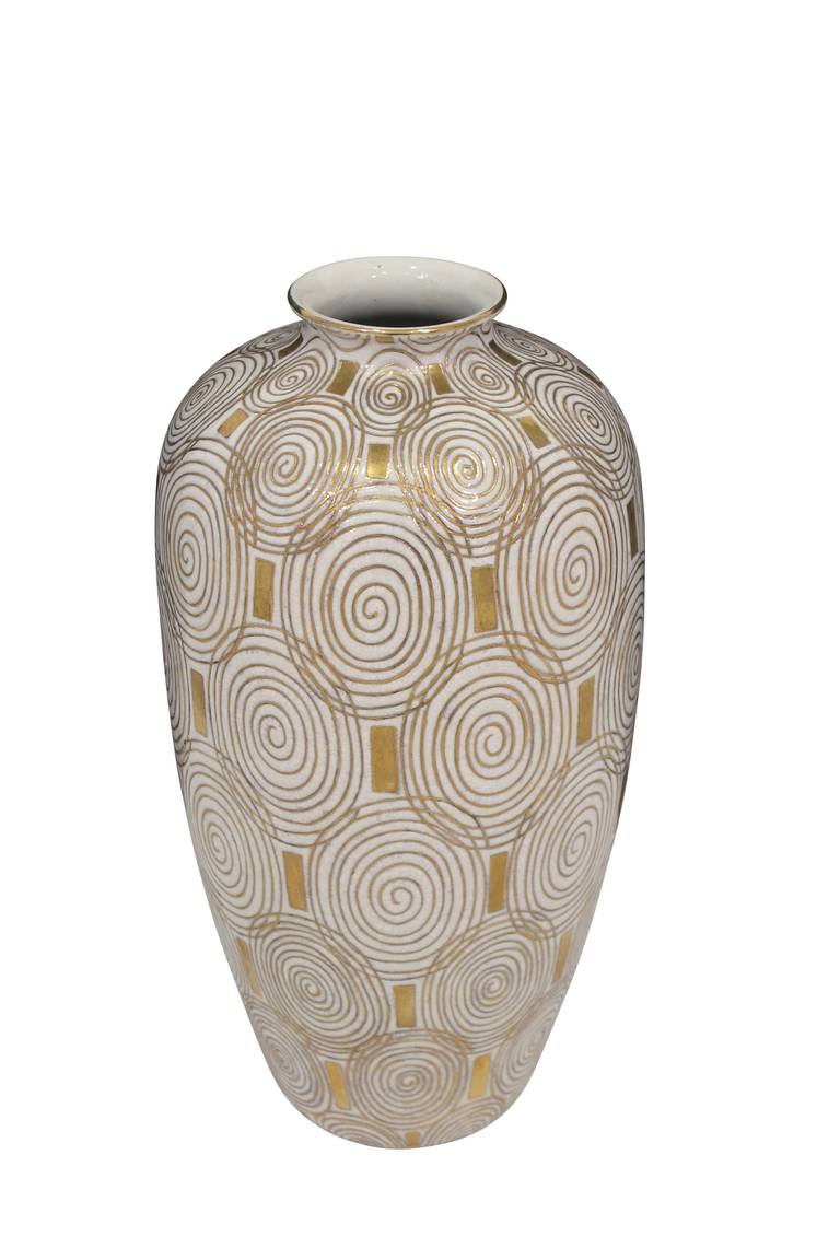 Art Deco inspired gold on white glazed ceramic vase. Signed on bottom of vase and dated 1991.