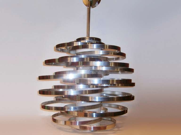 The aluminum ribbons create a kinetic visual effect. One of Sauze's foremost designs.