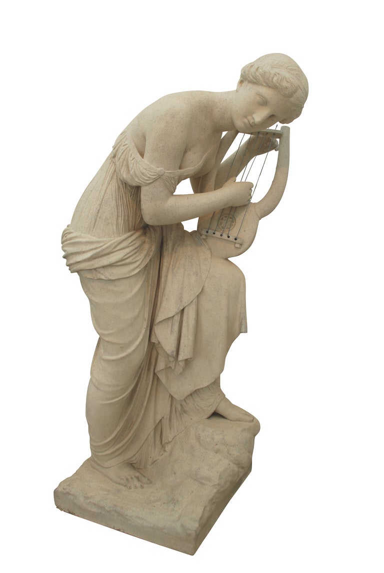A 19th century terracotta statue of Erato by Villeroy & Boch.  The muse of lyric and love poetry Erato portrayed playing her attribute, the lyre. The nine muses were the companions of Apollo, daughters of jupiter and mnemosyne. Maker Villeroy &