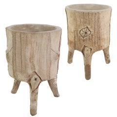 A pair of early 20th century composition stone faux bois planters