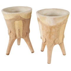 A pair of mid 20th century composition stone faux bois planters