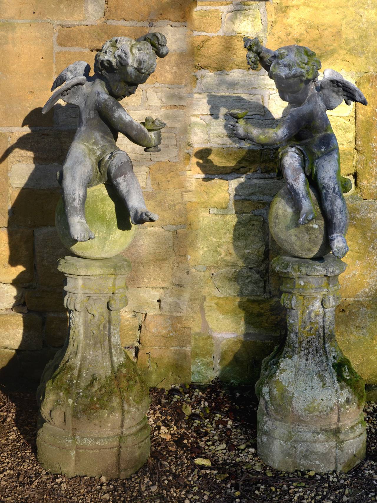 Pair of Early 20th Century Winged Lead Putti