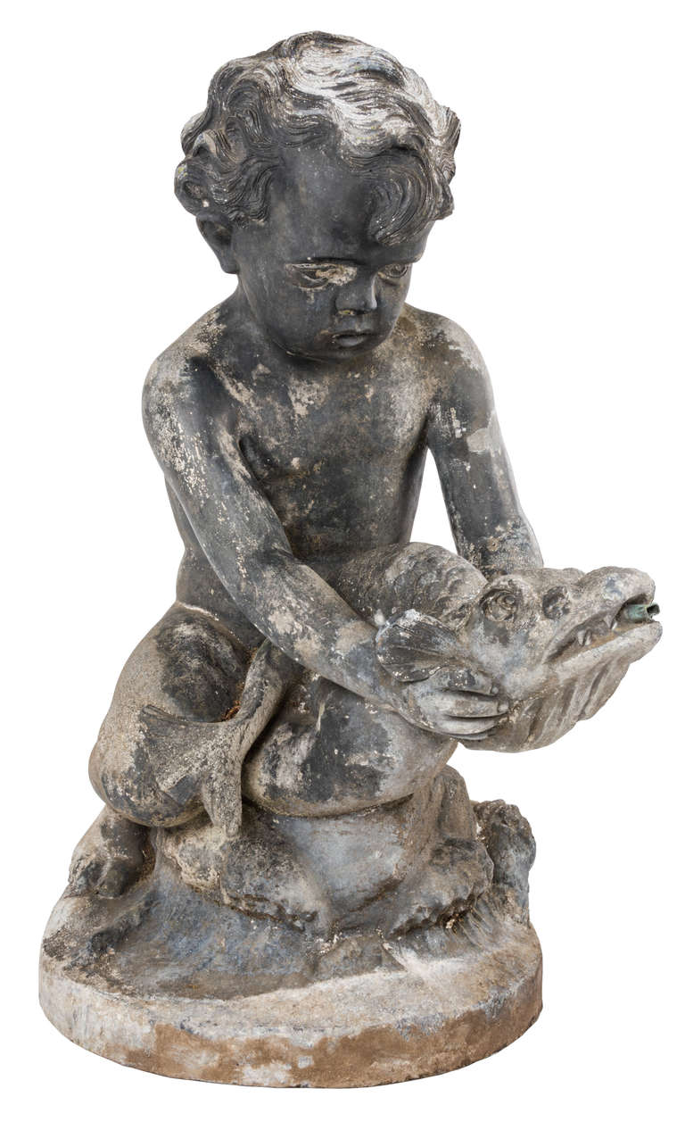An early 20th century lead fountain in the form of a boy holding a fish In Good Condition In Gloucestershire, GB