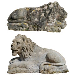 A pair of 19th century carved Bath stone lions after Canova