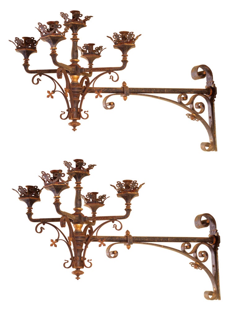 Gilt A neo-Gothic, French, wrought iron and parcel gilt wall light