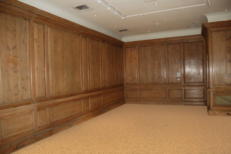 A large quantity of part 18th century Pine panelling removed from 40 New Bond Street, London. Approximately 90 feet at 11 ft 6 ins high, this panelling, which utilizes large 18th century panels, refitted around old pine stiles and rails. Originally