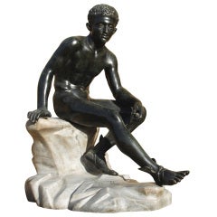 A small scale Neapolitan bronze of the Seated Hermes