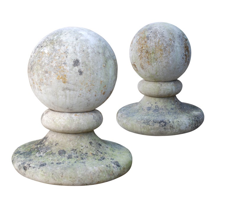 A pair of early 20th century Portland stone ball finials