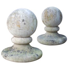 A pair of early 20th century Portland stone ball finials