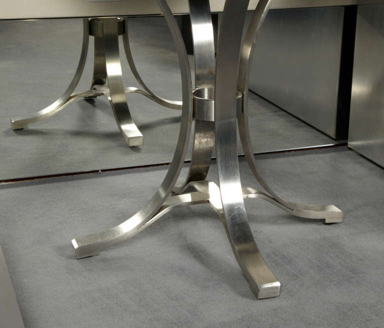 Pair of tables
Base brushed steel
Black tempered glass