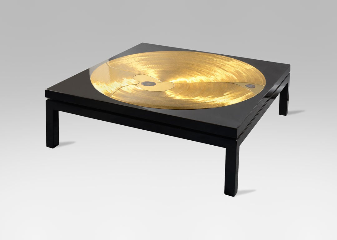 Spectacular pair of coffee tables by Fernand Dresse (1916-1993),
circa 1970.
Decor leaves brushed brass.
Brass elements and two agates.
Squared base.
Signed on the side of each table.