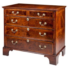 A Yew Wood Chest Of Drawers