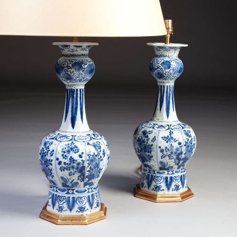 An exceptional pair of late 17th century Delft blue and white vases, each decorated in contemporary blue and white and heavily inspired by Chinese export Kangxi period porcelain. Now mounted as lamps.

Please contact us for the best shipping