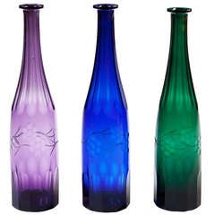 Antique A Group of Three Glass Bottles
