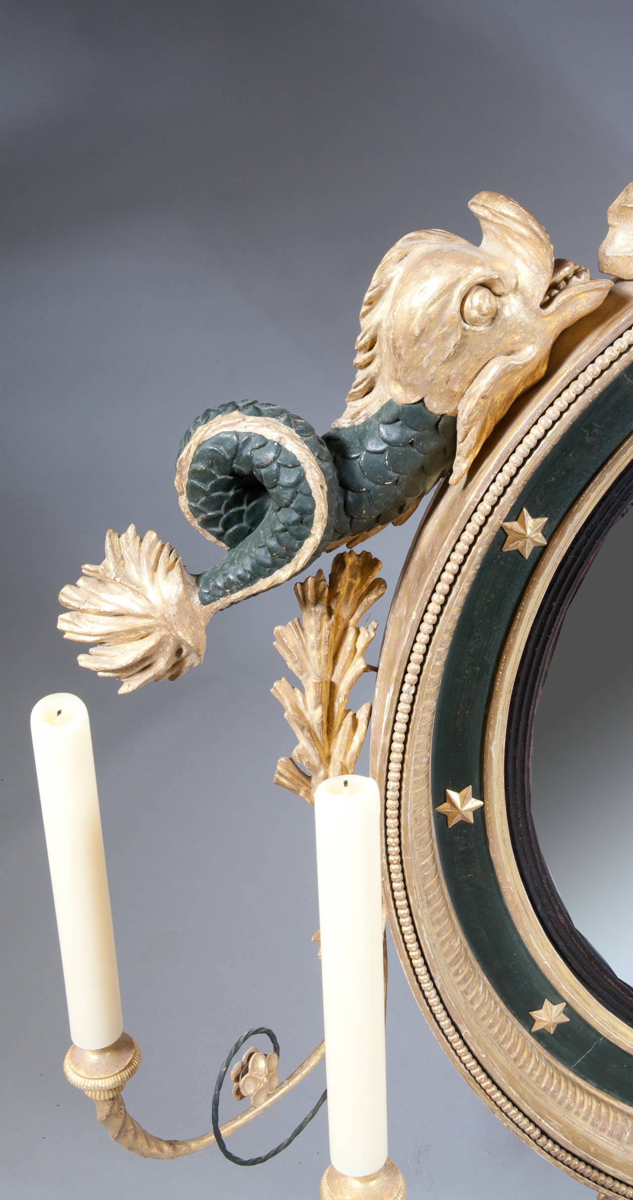 A large scale early 19th century Regency convex mirror.