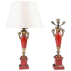A Pair Of Red Tole Lamps