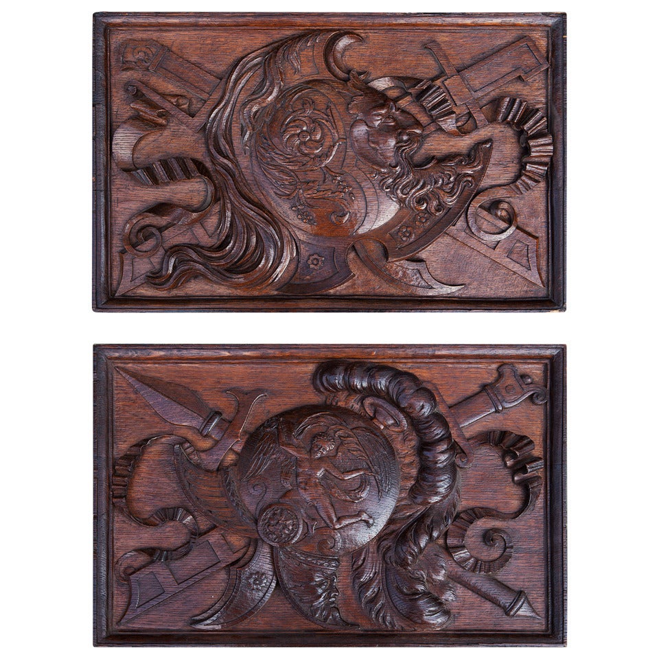 Pair of large scale French carved oak Trophy Panels